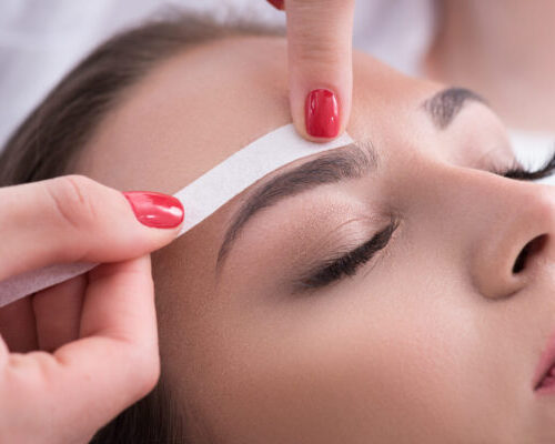 attractive woman brow depilation